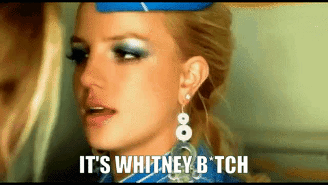 a close up of a woman 's face with the words it 's whitney b * tch on the bottom