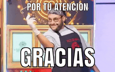 a man wearing an apron and gloves is standing in front of a machine that says gracias