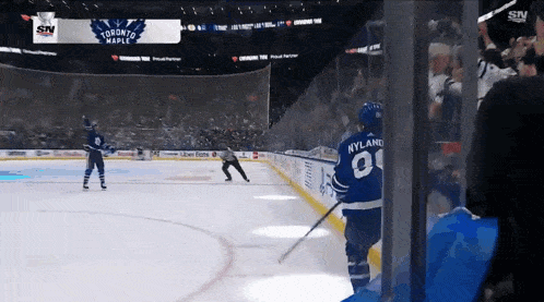 a hockey game is being played in toronto maple