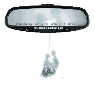 a rear view mirror with a picture of a couple and the words thinking of you while i drive