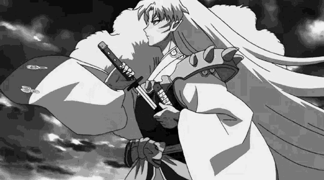 a black and white image of a samurai holding a sword .