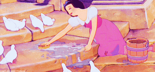 snow white is cleaning the floor with a sponge surrounded by pigeons