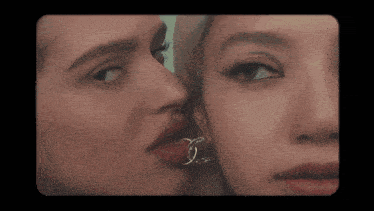 a close up of a woman 's face with a ring in her mouth