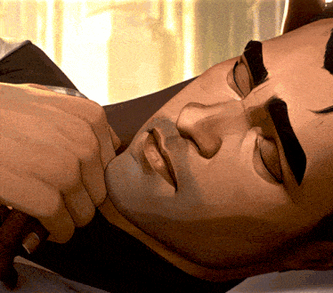 a close up of a man 's face with a hand on it