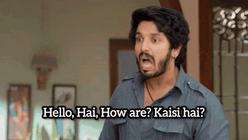 a man with a beard says hello hai how are kaise hai