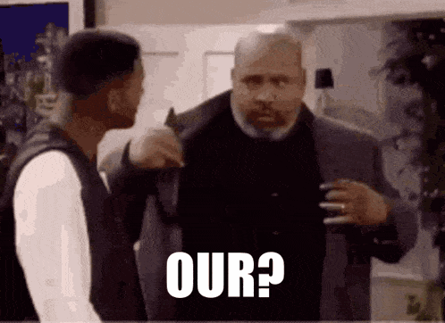 two men are standing next to each other and one of them is saying our