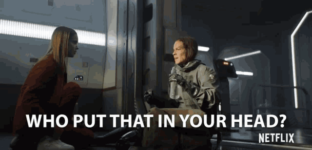 a woman in a wheelchair is talking to another woman with the words who put that in your head on the bottom