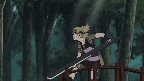 a woman is standing on a bridge holding a sword while another woman stands behind her .