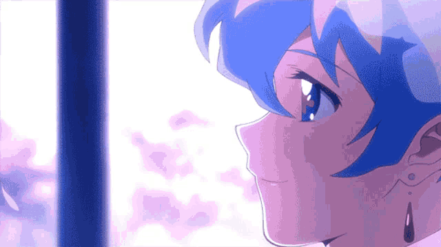 a close up of a person with blue hair