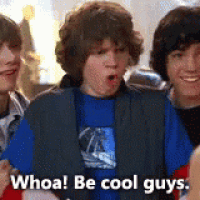 a group of boys are standing next to each other and one of them is saying `` whoa ! be cool guys '' .