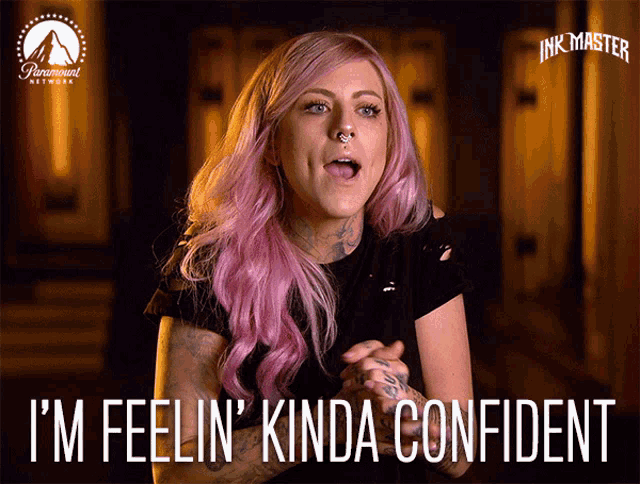 a woman with pink hair says " i 'm feelin kinda confident "