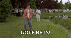 a man is standing in the grass on a golf course holding a golf club and saying `` golf bets '' .