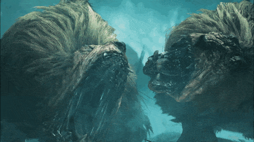 two monsters are looking at each other with their mouth open