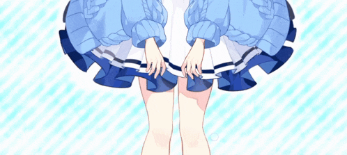 a girl in a blue dress with a braided sweater