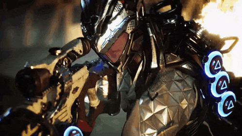 a man in a futuristic suit is holding a gun with arrows pointing in different directions