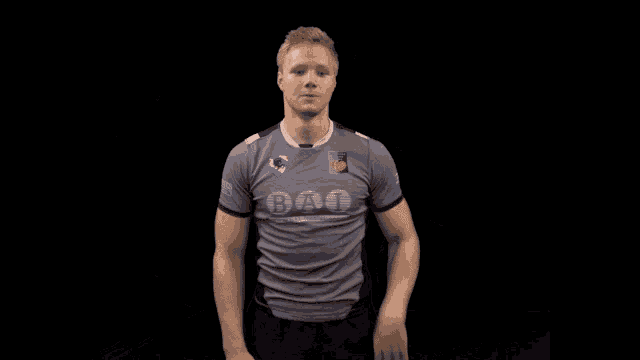 a man wearing a shirt that says ba1 on it