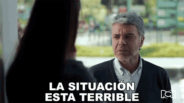 a man talking to a woman with the words la situacion esta terrible written on the bottom