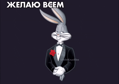 a picture of bugs bunny wearing a tuxedo with a red bow tie