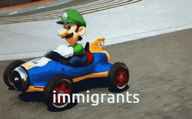 a toy mario kart with the word immigrants on the bottom