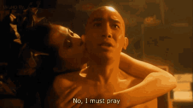 a man is being kissed by a woman with the words " no i must pray " on the bottom