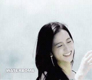 a close up of a woman 's face with the words `` waterbomb '' above her .