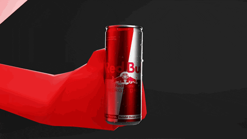 a red cartoon character is holding a can of coca cola