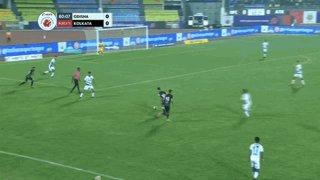 a soccer game is being played between odisha and kolkat