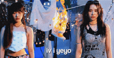 two girls are standing in front of a burning shoe and the words iv i yeyo are on the bottom