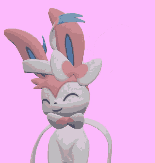 a pink and white bunny with blue ears is smiling