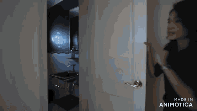 a woman in a black shirt is standing in a doorway made in animotica