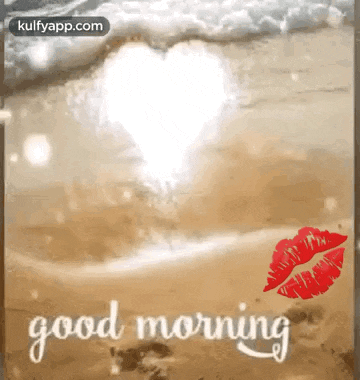 a good morning greeting card with a heart in the water and a kiss on the beach