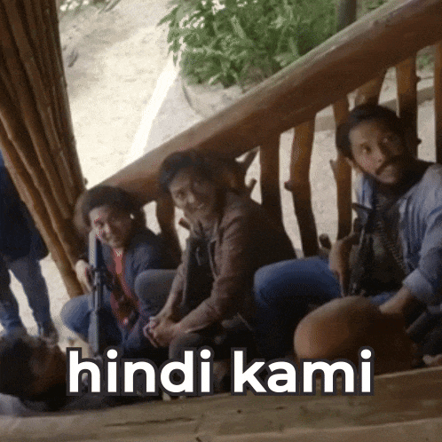 a group of people sitting on a balcony with the words hindi kami written on the bottom