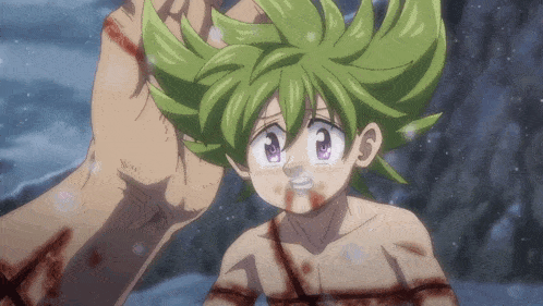 a little girl with green hair is being held by a man