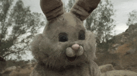 a stuffed bunny rabbit with a big smile on his face