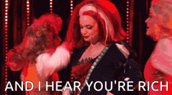 a woman with red hair says " and i hear you 're rich " while dancing