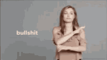 a woman is making a sign that says " bullshit "