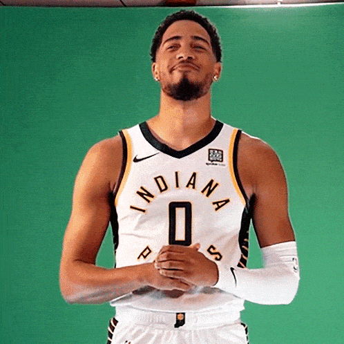 a man wearing an indiana jersey with the number 0