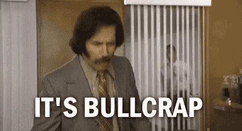 a man in a suit and tie is saying `` it 's bullcrap '' in an office .