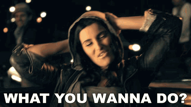 a woman in a hooded jacket is being asked what she wanna do