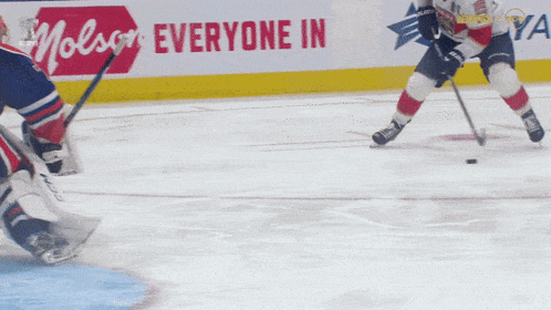 a hockey player with the number 14 on his back