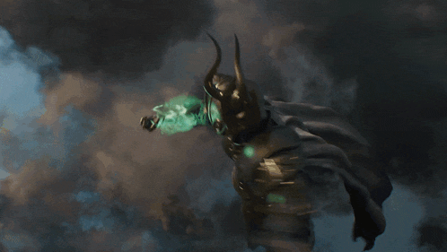 a man with horns and a cape is holding a sword