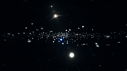 a black background with a lot of white dots and stars