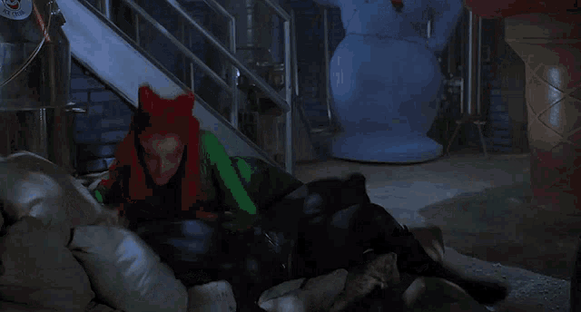 batman and poison ivy in a scene from the movie batman