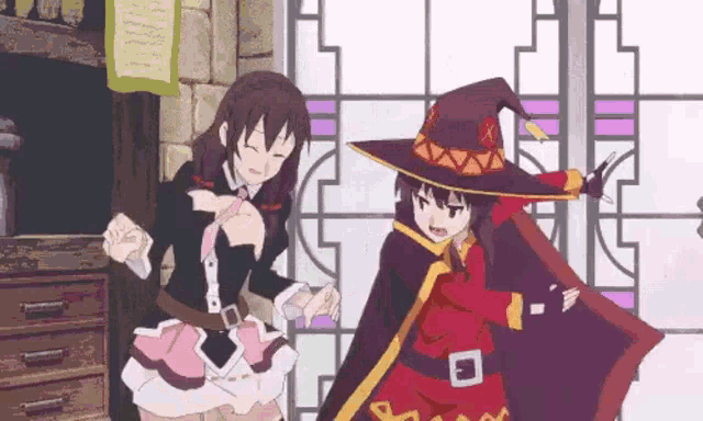 a couple of anime girls are standing next to each other in front of a window .