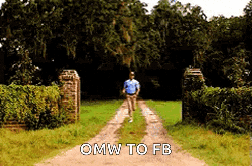 a man is running down a dirt road with the words omw to fb written on it .