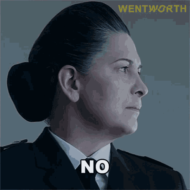 a woman in a uniform has the word no written on her face