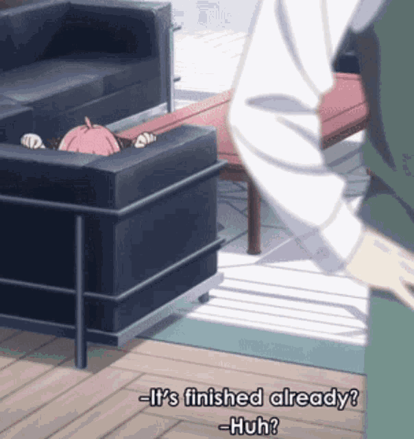 a man standing next to a couch with a girl peeking out of it and the words " it 's finished already "