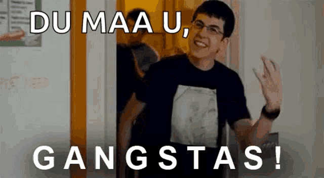 a man wearing glasses is standing in a doorway with the words du maa u gangstas written on the bottom