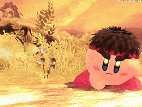 a cartoon character named kirby is laying on the ground in a field