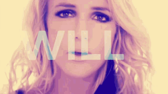 a woman 's face is behind the word will